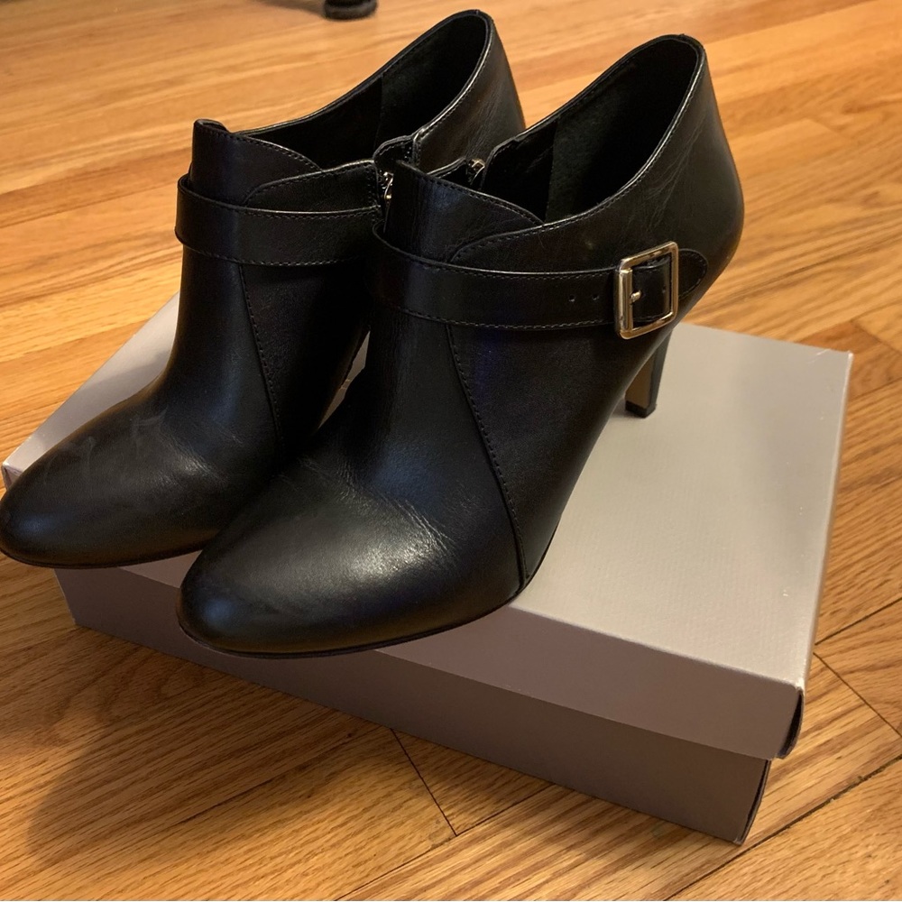 Black leather ankle booties.